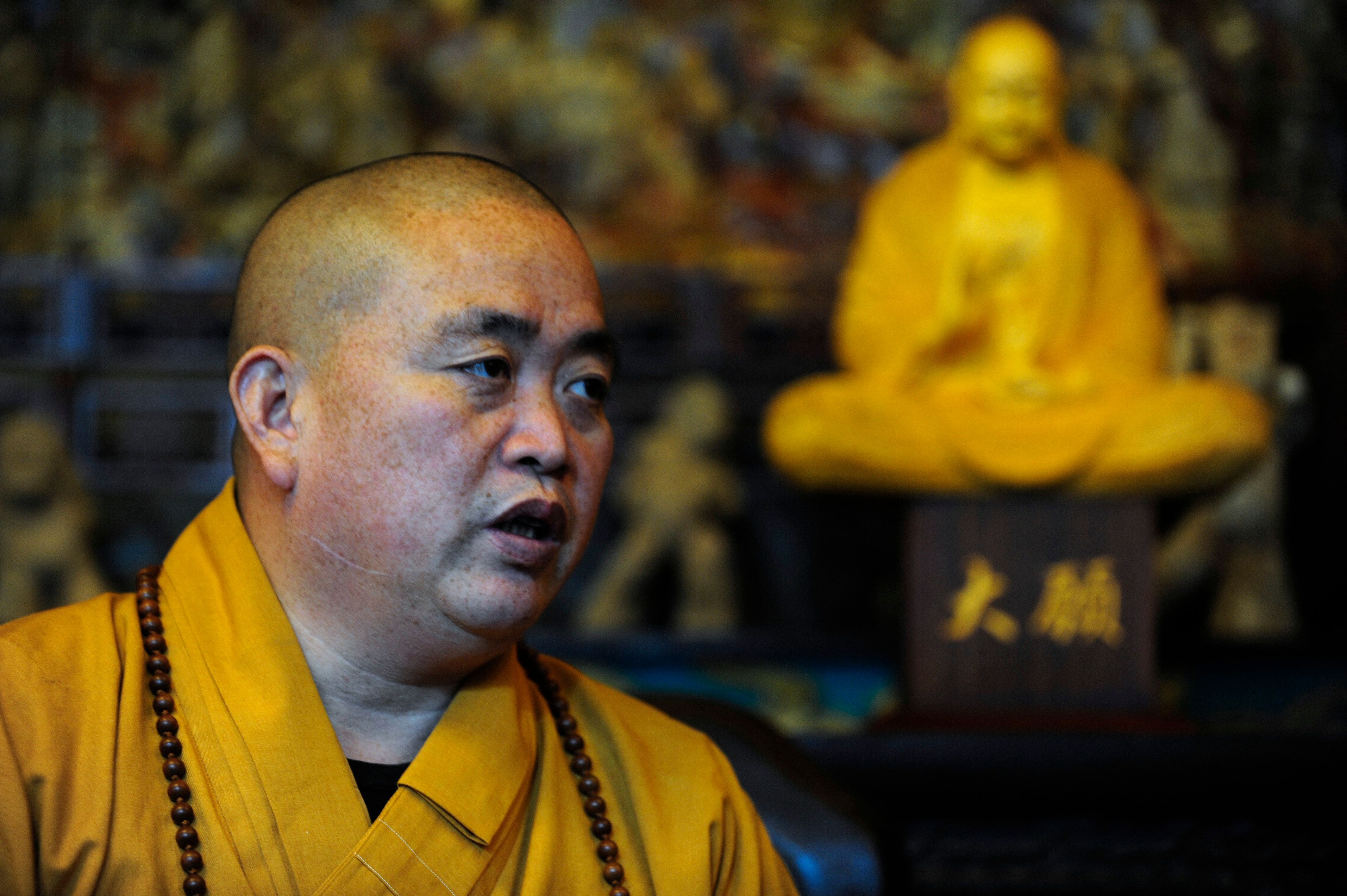 ซือ หยงซิน ขณะดำรงตำแหน่งเจ้าอาวาสวัดเส้าหลินในปี 2009 (ภาพจาก: Peter Parks/AFP)