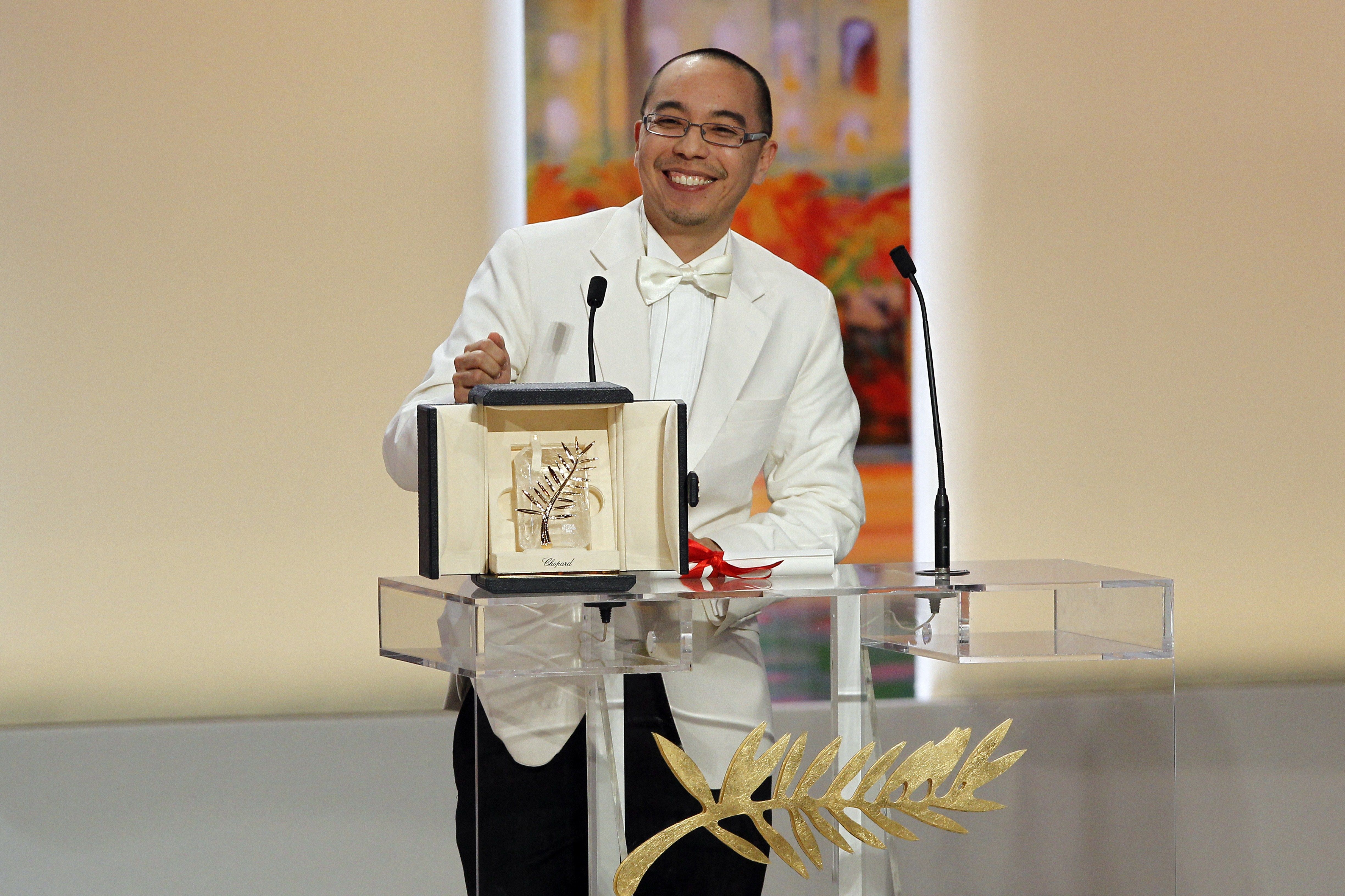 Apichatpong Weerasethakul, one of the Thai ‘New Wave’ film directors, while receiving the Palm d’Or in 2010 (Photo: Francois Guillot/AFP)