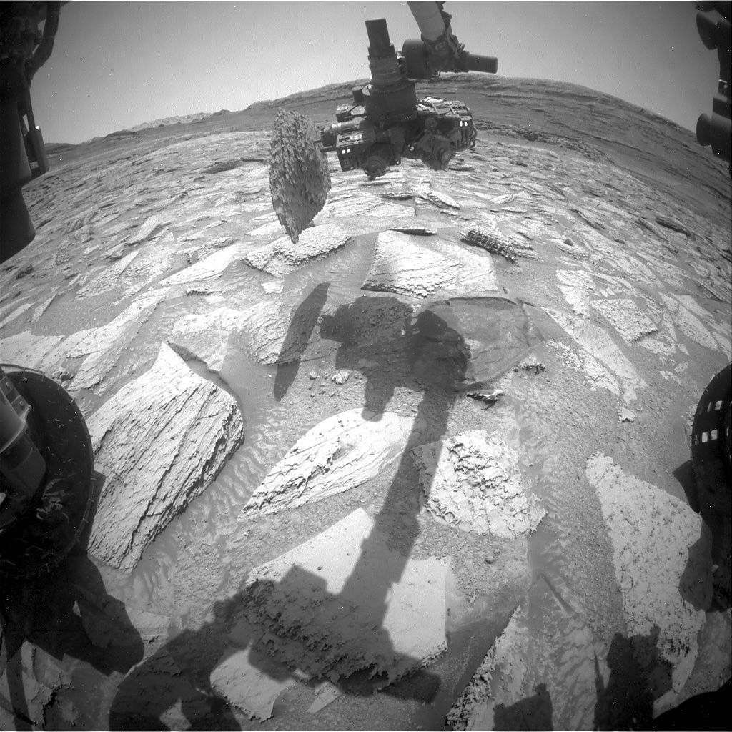 ภาพถ่ายจากกล้องของหุ่นยนต์คิวริออซิตีที่สว่านแขนกล ภาพจาก NASA