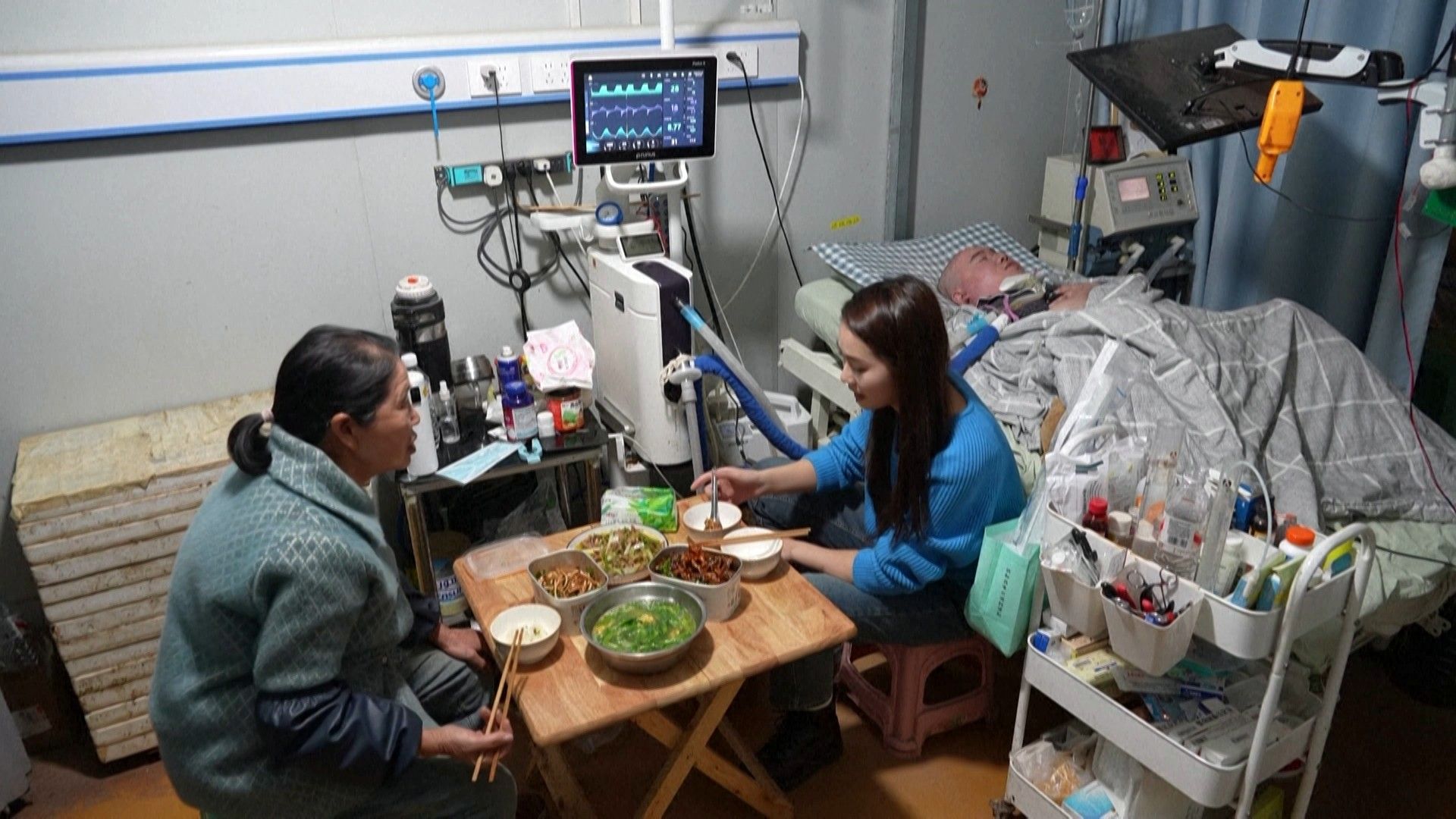 Li Xia และครอบครัว (ภาพ: AFP)